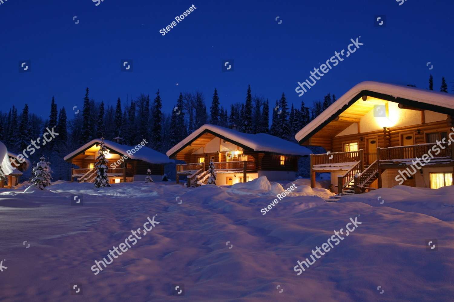 Hermosas cabañas por la noche en invierno rompecabezas en línea