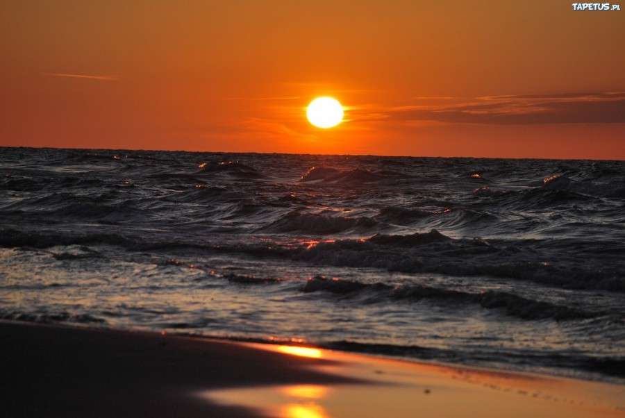 Puesta de sol sobre el mar rompecabezas en línea