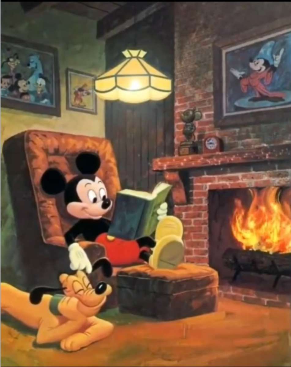 Topolino legge accanto al fuoco puzzle online