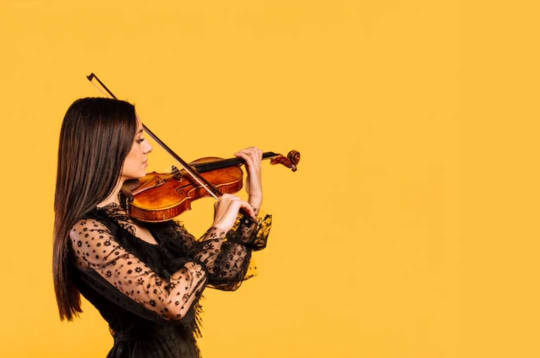 Menina tocando violino quebra-cabeças online