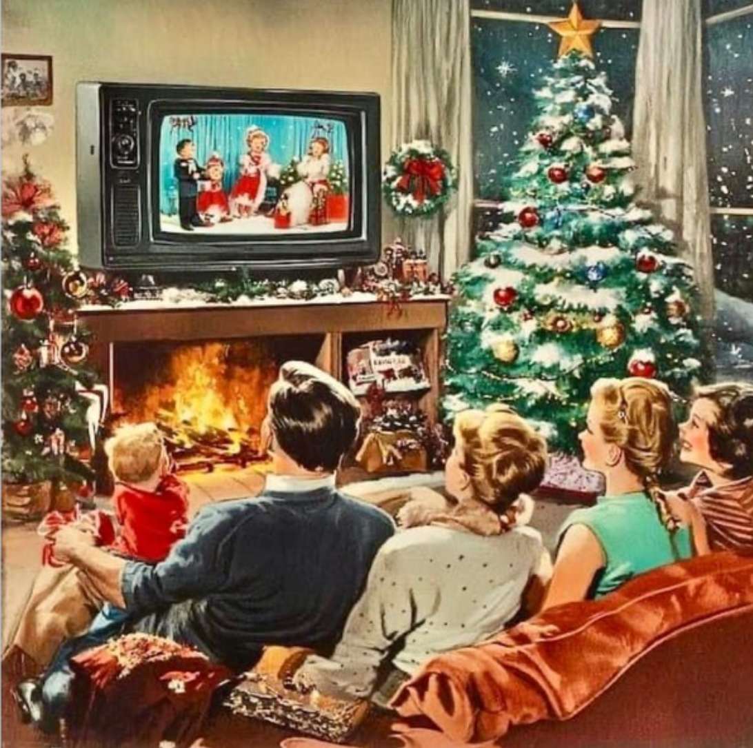 Moment en famille autour de la télé à Noël puzzle en ligne