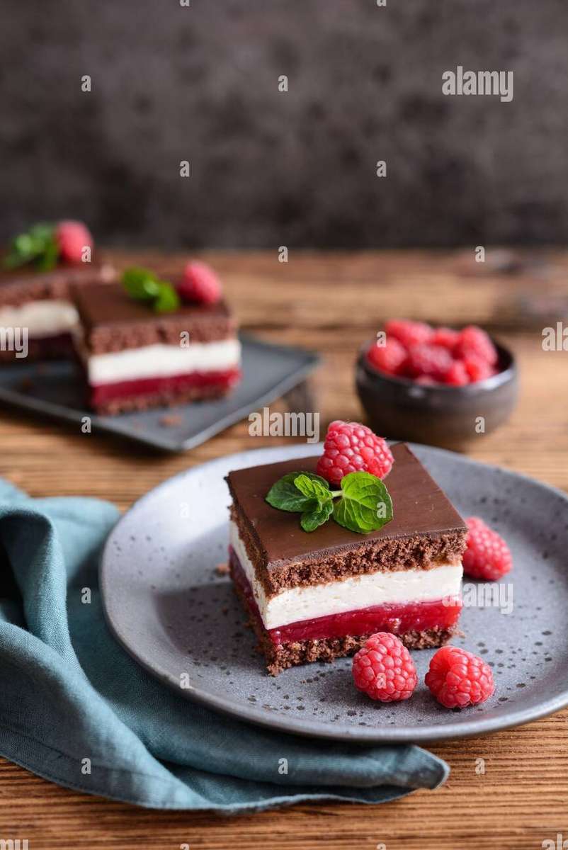 Cheesecake al cioccolato con lamponi puzzle online