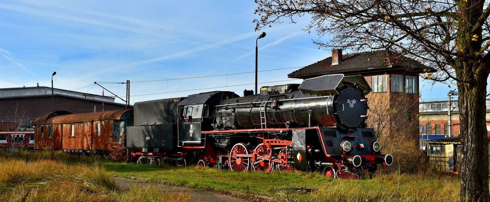 Eine Dampflokomotive am Bahnhof Toruń Kulczyki Puzzlespiel online