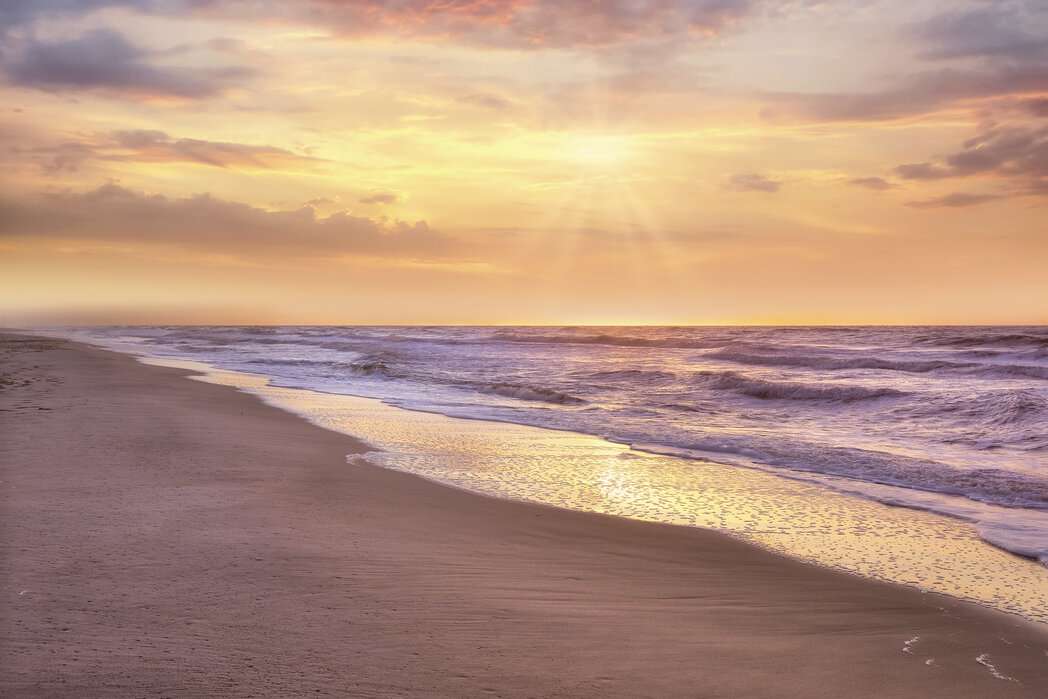 Naplemente a strandon kirakós online