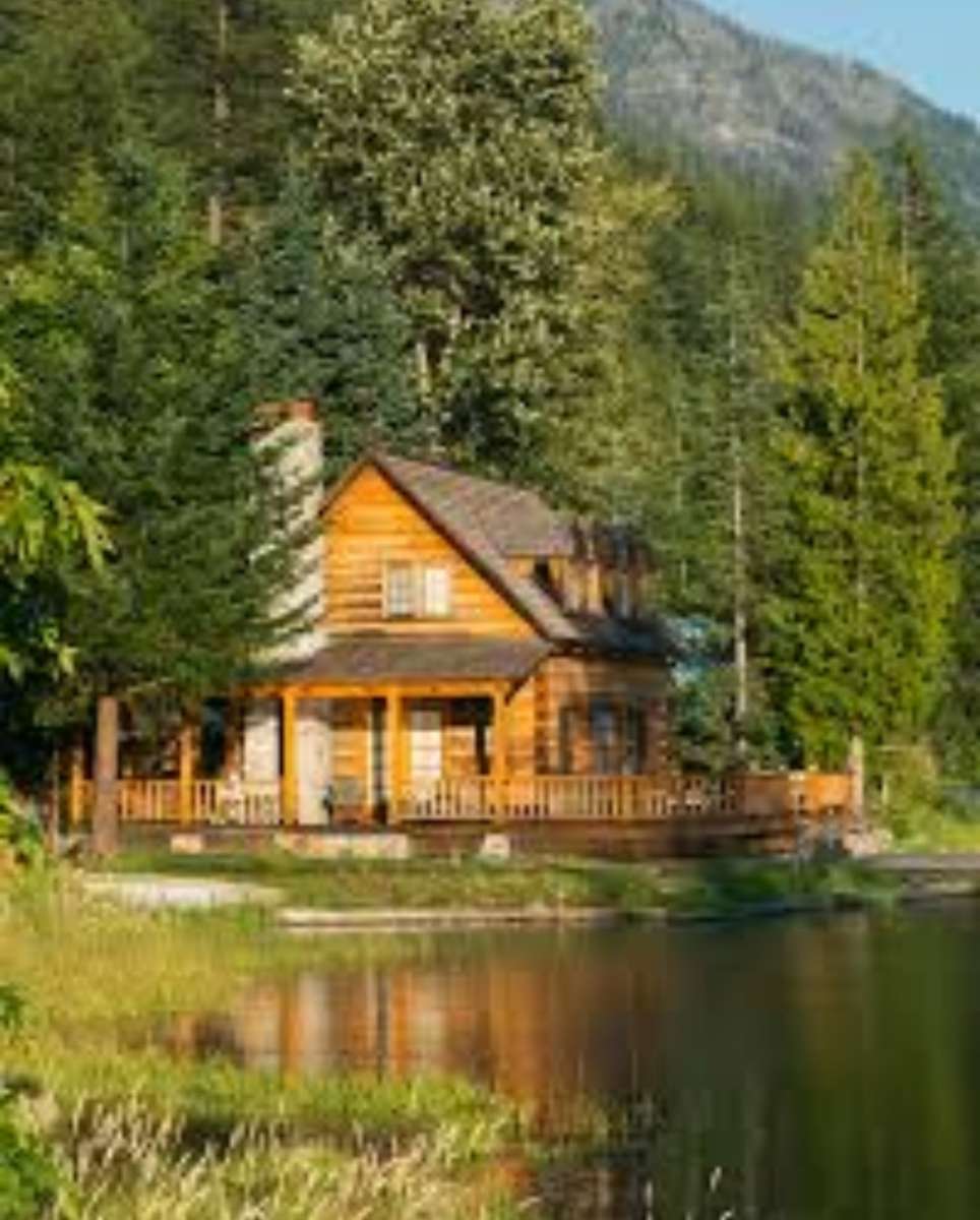 Hus vid vattnet pussel på nätet