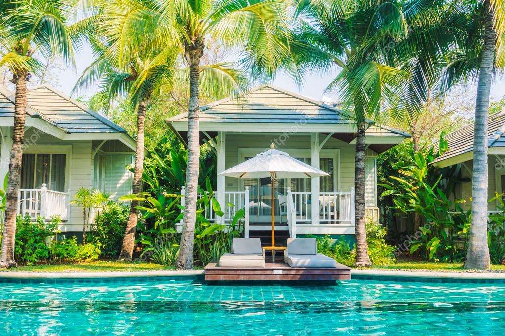 Maison avec une piscine et des transats puzzle en ligne