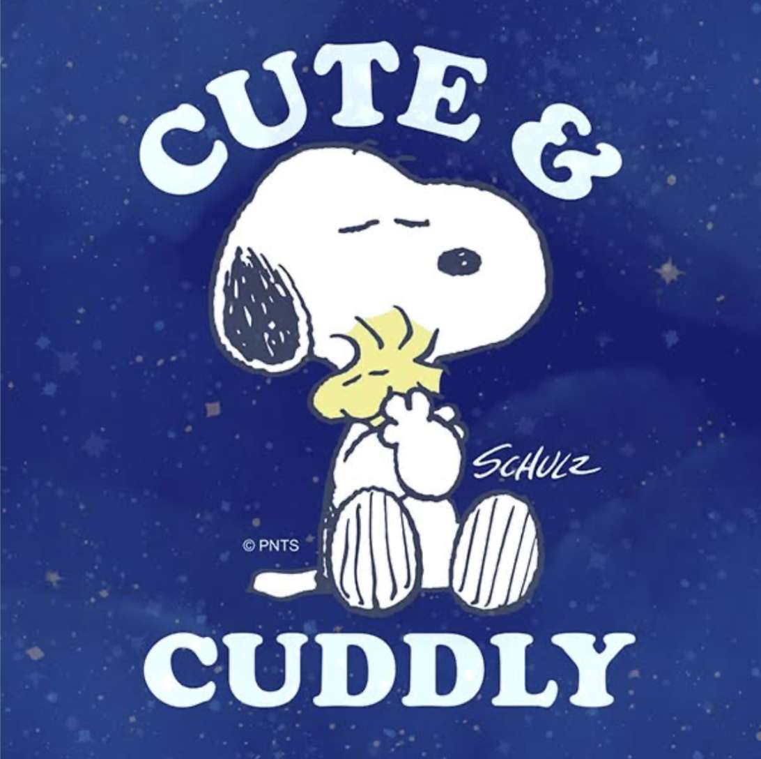 Snoopy przytula się do Woodstock na niebieskim tle puzzle online