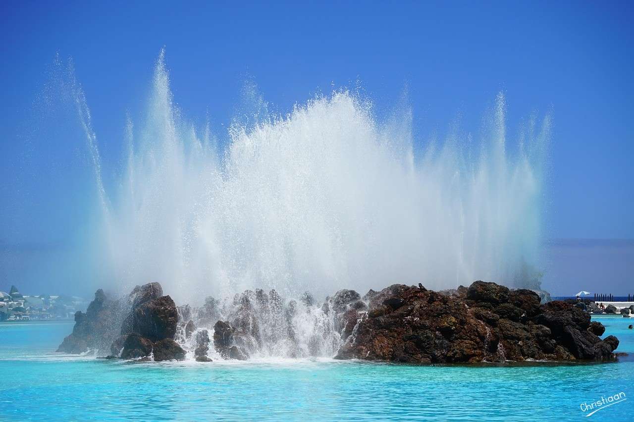 Fontana, piscina, rocce. puzzle online