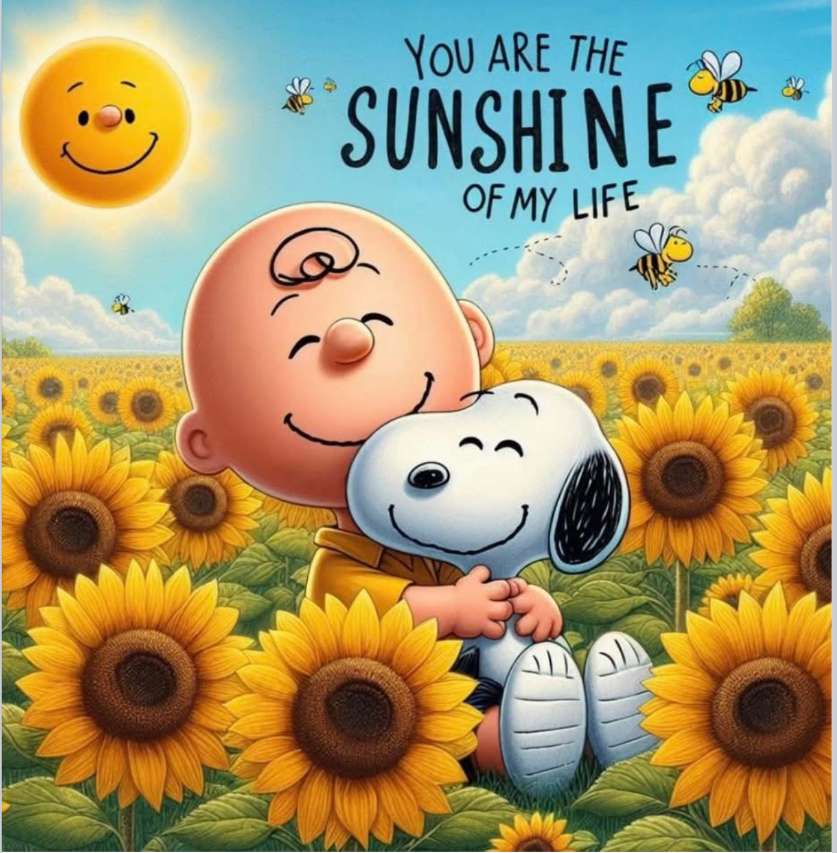 Charlie i Snoopy pośród morza słoneczników puzzle online