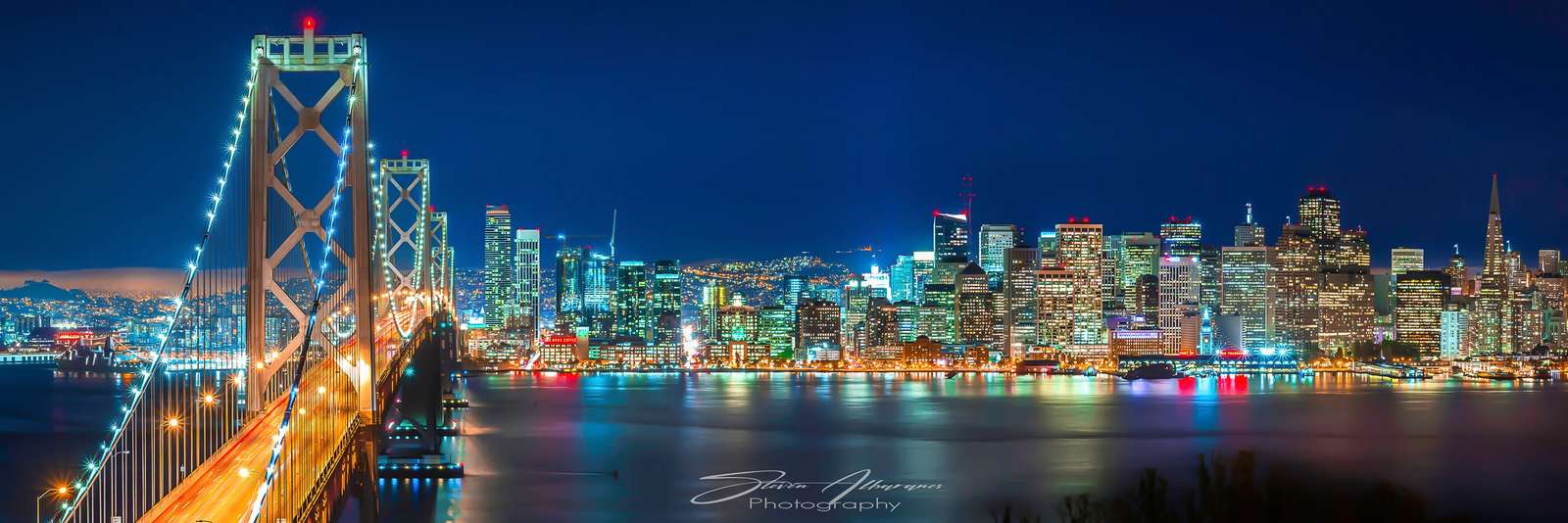 San Francisco Bay Bridge and Night Skyline puzzle online