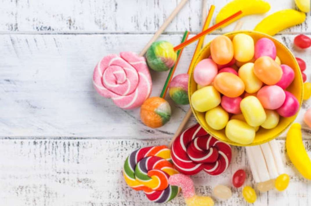 Бонбони, близалки и желета онлайн пъзел