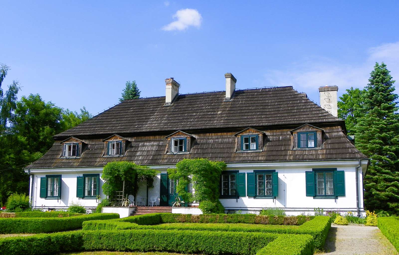 Herrenhaus im Sommer Puzzlespiel online