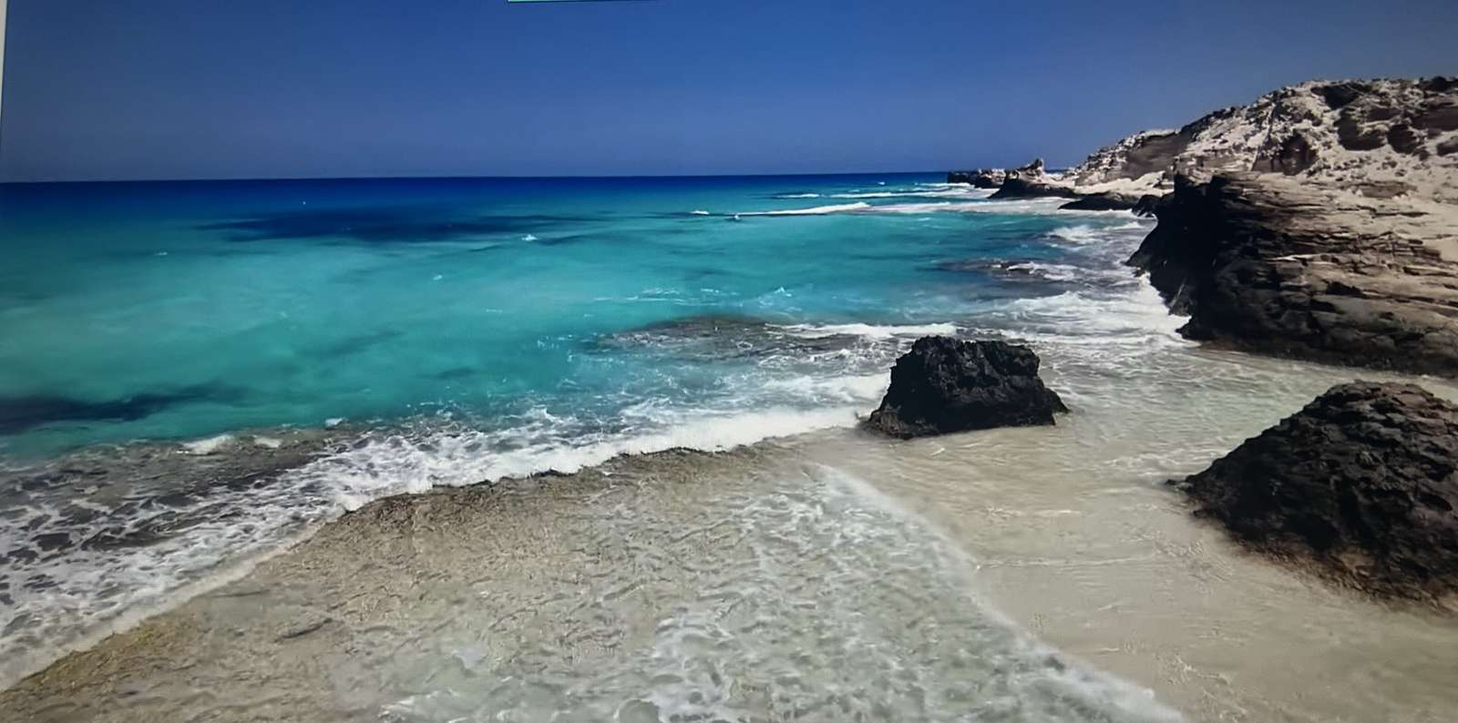 türkisfarbenes Meer Puzzlespiel online