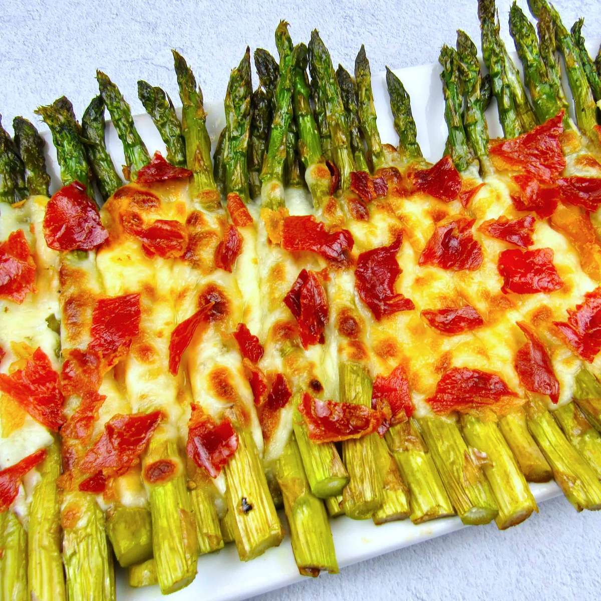 Espárragos asados con queso rompecabezas en línea