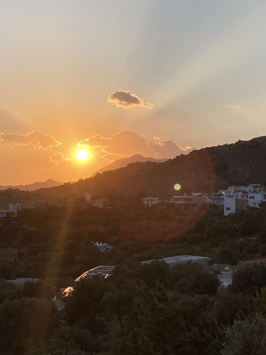 Vista do pôr do sol em Mariou Creta quebra-cabeças online