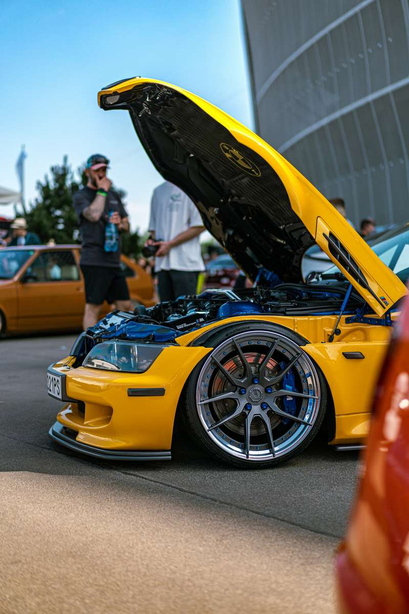 a yellow tuning car with open hood online puzzle