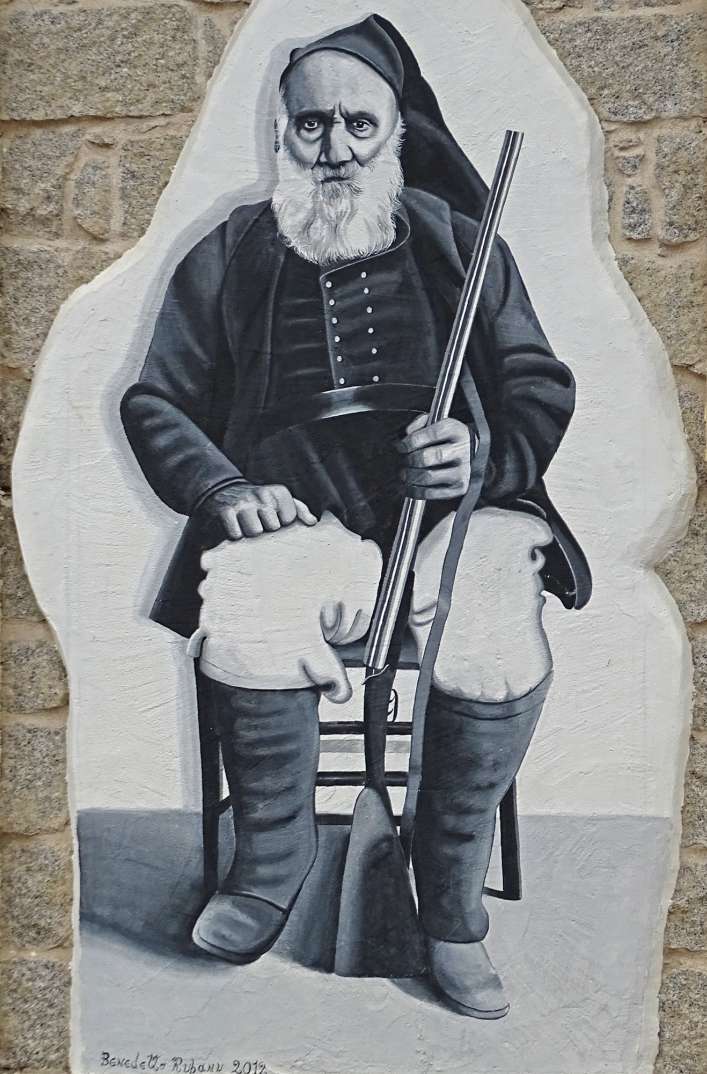 Sardinien. Orgosolo. Via Santa Caterina pussel på nätet