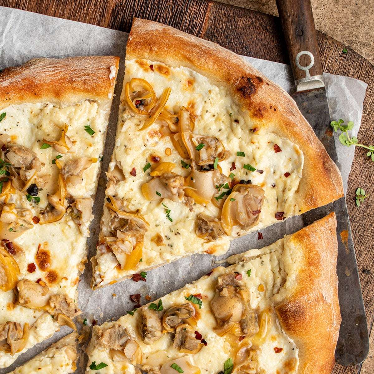 Pizza aux palourdes blanches puzzle en ligne